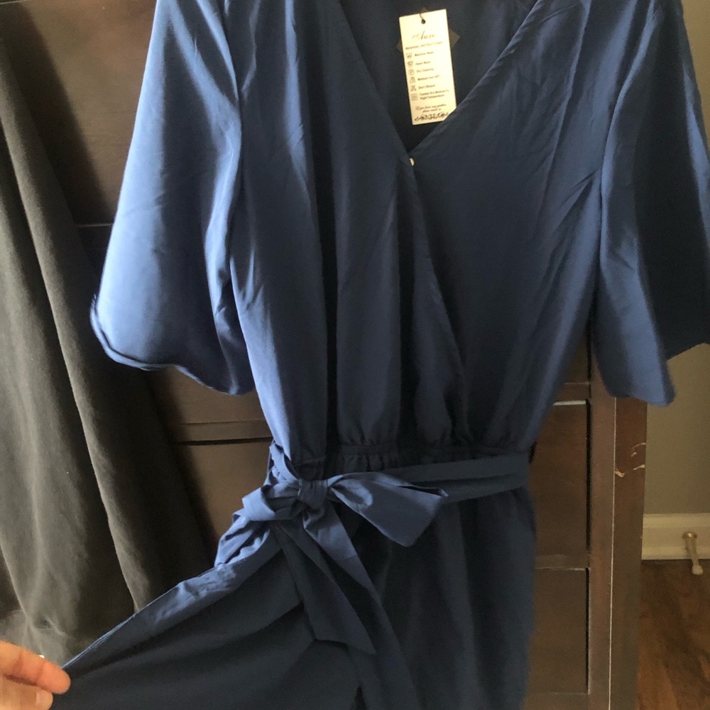 Navy blue romper, never worn